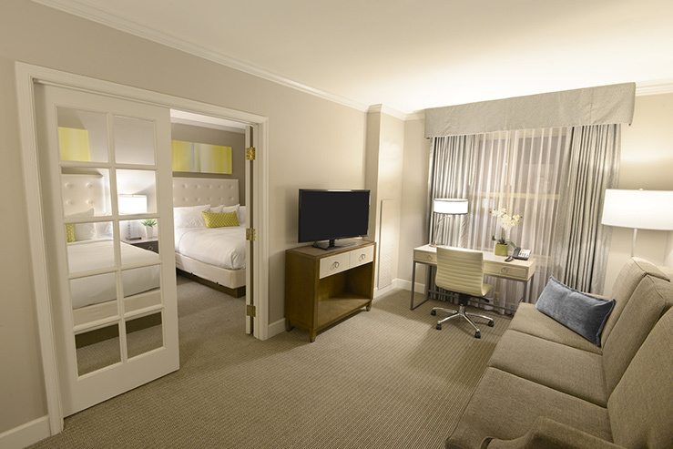 A suite living room—space to work, or entertain. 